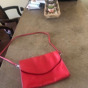 Large skinny red hand bag
